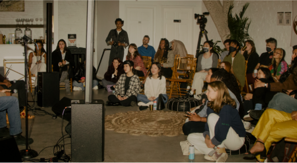 Group of people listening to a speaker during Intersectional Environmentalist Earth Session